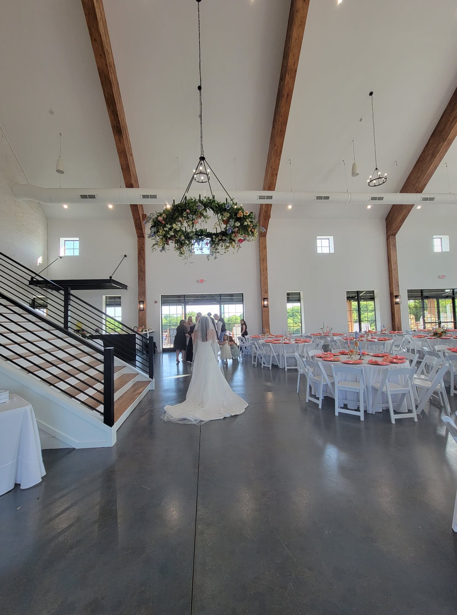 bride walking thru the reception area